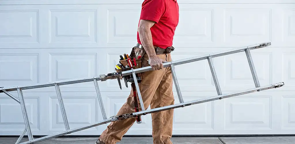 Garage door repair technician arriving with tools and ladder in Bakersfield, CA