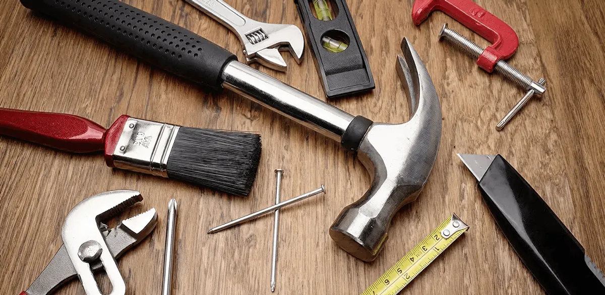 Handyman tools laid out for home repair and maintenance work in Bakersfield, CA