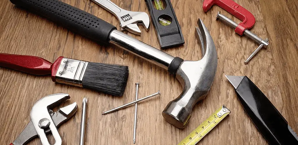 Handyman tools laid out for home repair and maintenance work in Bakersfield, CA